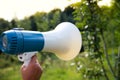 A woman holds a megaphone in her hand Royalty Free Stock Photo