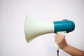 A woman holds a megaphone in her hand Royalty Free Stock Photo