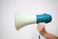 A woman holds a megaphone in her hand Royalty Free Stock Photo