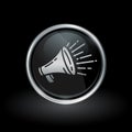 Announcement loudspeaker icon inside round silver and black emblem