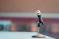 Announcer microphone on table before boxing ring Royalty Free Stock Photo