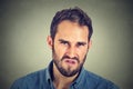 Annoyance. Angry displeased man Royalty Free Stock Photo