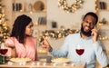 Angry Black Woman On Date, Man Talking On Mobile Phone Royalty Free Stock Photo