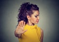 Annoyed angry woman with bad attitude giving talk to hand gesture Royalty Free Stock Photo