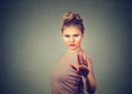 Annoyed angry woman with bad attitude giving talk to hand gesture Royalty Free Stock Photo