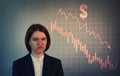 Annoyed businesswoman, discouraged and depressed look due recession. Economic crisis concept, stock market financial graphs Royalty Free Stock Photo