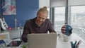 Annoyed guy screaming video call at workplace closeup. Angry man gesturing hands