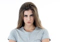 Portrait of a beautiful young woman with angry face looking furious. Human expressions and emotions Royalty Free Stock Photo