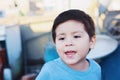 Annoyed little latin boy outside. Royalty Free Stock Photo