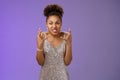Annoyed pissed arrogant freak-out african american woman in silver dress squeeze fists angry frowning grimacing anger Royalty Free Stock Photo