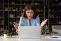 Annoyed stressed businesswoman having problem with laptop