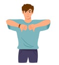Annoyed and unhappy man showing his negative attitude with thumb down gesture. Dislike, disagree, disappointment
