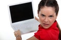 Annoyed woman with a laptop