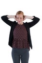 Annoyed woman covering her ears Royalty Free Stock Photo