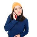 Annoyed young girl on the phone, isolated on white background. Annoying female talking. Nuisance and smartphone