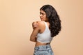 Annoyed young indian woman scratching her irritated body skin Royalty Free Stock Photo