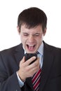 Annoyed young manager shouts aloud in cell phone