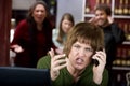 Annoying woman on her cell phone Royalty Free Stock Photo
