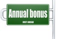Annual bonus word on green road sign