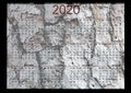 A 2020 annual calendar with wood pattern background