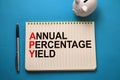 Annual percentage yield, text words typography written on book, life and business motivational inspirational