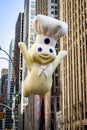 Annual Thanksgiving Macys parade with inflated Pillsbury Doughboy character