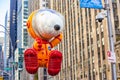 Annual Thanksgiving Macys parade with inflated Snoopy character