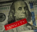 Annuity label on hundred dollar bill Royalty Free Stock Photo