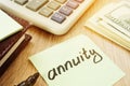 Annuity sign and calculator. Money for savings. Royalty Free Stock Photo