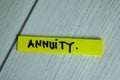 Annuity write on sticky notes isolated on office desk. Selective Focus on Annuity Text