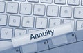 Annuity - Inscription on White Keyboard Key