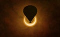 Annular solar eclipse in dark red sky. Hot air balloon rising high into sky