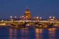 The Annunciation Bridge and the dome of St. Isaac Cathedral in the night scenery. Saint Petersburg, Russia Royalty Free Stock Photo