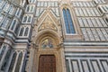 Annunciation mosaic, carved sculpted angels on Porta della Mandorla in Florence, Italy