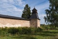 Annunciation Tower with fortress wall of Holy Dormition Pskovo-Pechersky Monastery. Pechory, Russia Royalty Free Stock Photo