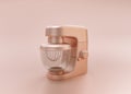 Anodized Rose Gold Material single color kitchen appliance,DoughMixer, on light pinkish color background, 3d rendering, utensil