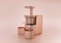 Anodized Rose Gold Material single color kitchen appliance, Juicer, on light pinkish color background, 3d rendering, utensil