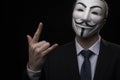 Anonymous activist hacker with mask studio shot