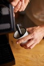 An Anonymous Barista Making a Cappuccino in a Coffee Chop Royalty Free Stock Photo