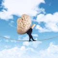 Anonymous businessman carrying brain 1