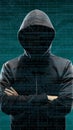 Anonymous computer hacker over abstract digital background. Obscured dark face in mask and hood. Data thief, internet attack Royalty Free Stock Photo