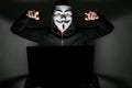 Hacker with anonymous mask