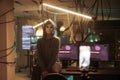 Anonymous hacker attacking database server portrait, cybercrime Royalty Free Stock Photo
