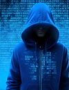 Anonymous Hacker in Blue Hoodie Surrounded by Cryptic Code