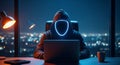 Anonymous hacker coding at computer at night with cityscape background Royalty Free Stock Photo