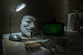 An anonymous hacker tries to crack the operating system`s protection