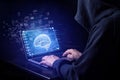 Hacker exploits AI-chip on a laptop in a dark cyber-security scene. Royalty Free Stock Photo