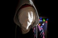 Anonymous head face in the hood maniac in dark situation f