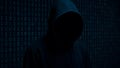 Anonymous hooded figure against digital binary code image generated using AI. Royalty Free Stock Photo
