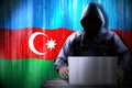 Anonymous hooded hacker, flag of Azerbaijan, binary code - cyber attack concept Royalty Free Stock Photo